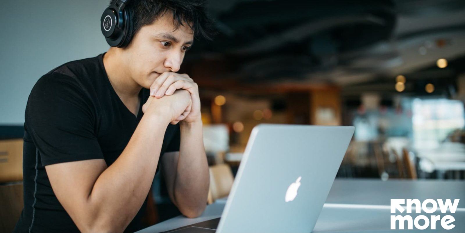 man studying at laptop